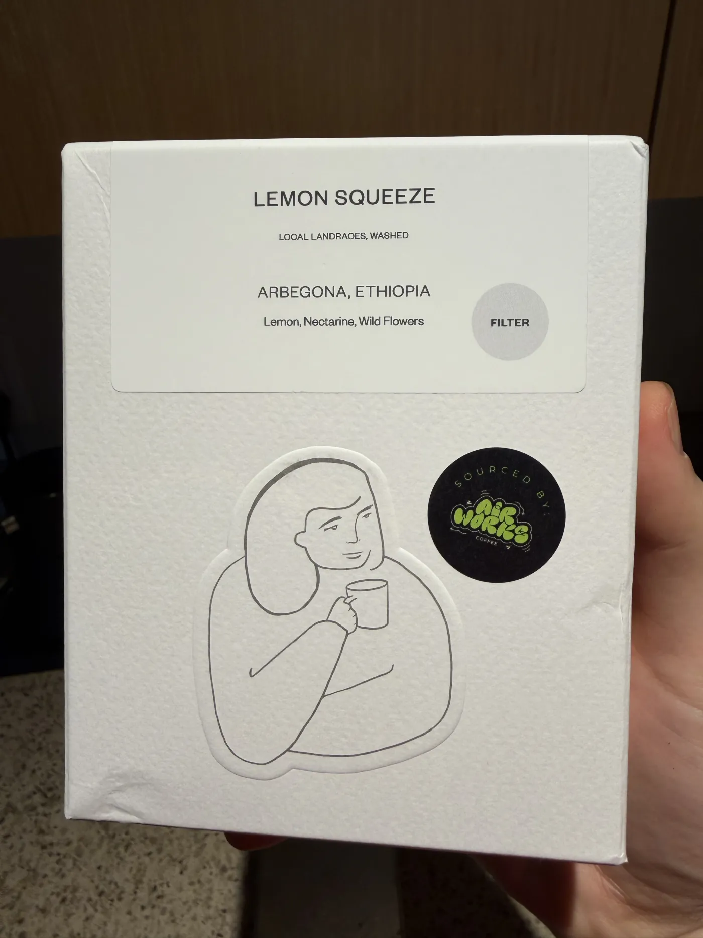 The DAK Lemon Squeeze box: "Lemon Squeeze, local landraces, washed, Arbegona, Ethiopia, Lemon, Nectarine, Wild Flowers," with a "Sourced by Airworks Coffee" sticker.